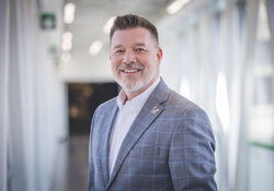 John P. Keller, BA '01